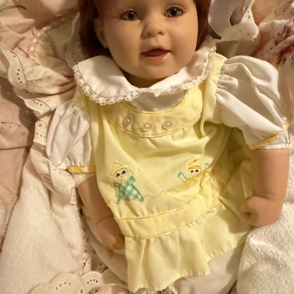 Adorable Baby Doll with Pink Bow - Picture 9 of 9